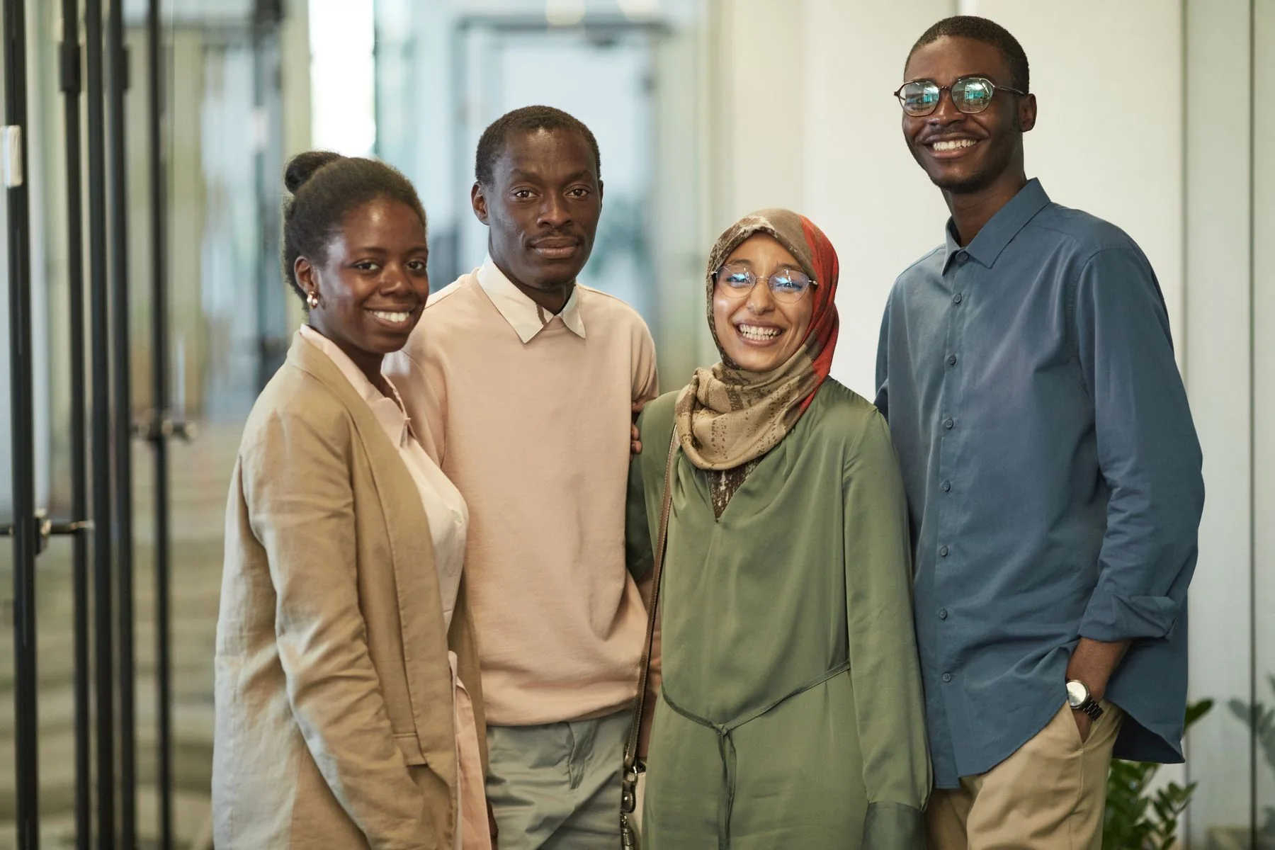 A welcoming multicultural group of adults